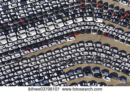 Stock Photo - "Aerial view, queues of new cars waiting to be transported at the Unikai, Port of Hamburg, Hamburg, Germany, Europe". Fotosearch