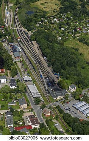 "Aerial view, railway station and depot of the narrow gauge railway, Rasender Roland, in Putbus on the island of Ruegen, Rugen, Putbus, Mecklenburg-Western Pomerania, Germany, Europe" View Large Photo Image Stock Photography - "Aerial view, railway station and depot of the narrow gauge railway, Rasender Roland, in Putbus on the island of Ruegen, Rugen, Putbus, Mecklenburg-Western Pomerania, Germany, Europe". Fotosearch