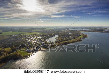 "Aerial view, Rechlin-Nord with harbor village and marina, branch canal to Claassee Lake, Mecklenburg Lake District, Rechlin, Mecklenburg-Western Pomerania, Germany, Europe" View Large Photo Image Stock Photo - "Aerial view, Rechlin-Nord with harbor village and marina, branch canal to Claassee Lake, Mecklenburg Lake District, Rechlin, Mecklenburg-Western Pomerania, Germany, Europe". Fotosearch