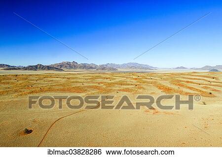 "Aerial view, red sand of the Namib Desert, Wolwedans, NamibRand Nature Reserve, Namibia, Africa" View Large Photo Image Stock Photograph - "Aerial view, red sand of the Namib Desert, Wolwedans, NamibRand Nature Reserve, Namibia, Africa". Fotosearch