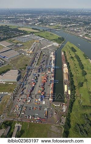 "Aerial view, Rheinhausen Logport, container terminal, Rhine, Duisburg, Ruhr Area, North Rhine-Westphalia, Germany, Europe" View Large Photo Image Stock Photo - "Aerial view, Rheinhausen Logport, container terminal, Rhine, Duisburg, Ruhr Area, North Rhine-Westphalia, Germany, Europe". Fotosearch