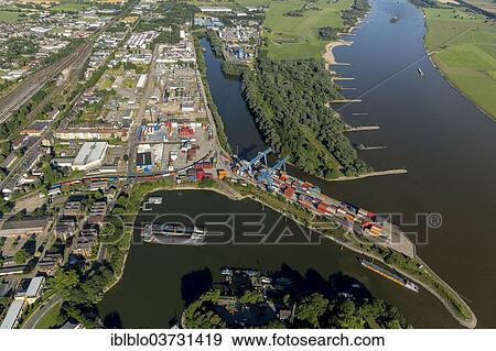 "Aerial view, Rhine port and Emmerich container terminal, Emmerich am Rhein, North Rhine-Westphalia, Germany, Europe" View Large Photo Image Stock Photo - "Aerial view, Rhine port and Emmerich container terminal, Emmerich am Rhein, North Rhine-Westphalia, Germany, Europe". Fotosearch