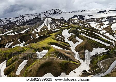 "Aerial view, rhyolite mountains partially covered with snow, Landmannalaugar, Fjallabak conservation area, Icelandic Highlands, Iceland, Europe" View Large Photo Image Stock Photography - "Aerial view, rhyolite mountains partially covered with snow, Landmannalaugar, Fjallabak conservation area, Icelandic Highlands, Iceland, Europe". Fotosearch