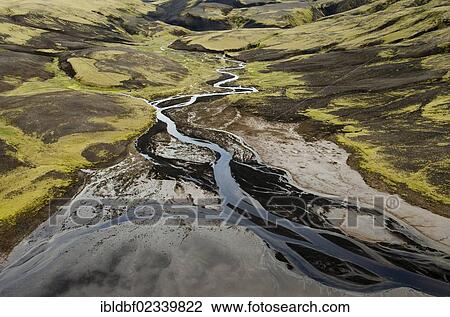 "Aerial view, river through a moss-covered landscape, Icelandic Highlands, Iceland, Europe" View Large Photo Image Stock Image - "Aerial view, river through a moss-covered landscape, Icelandic Highlands, Iceland, Europe". Fotosearch