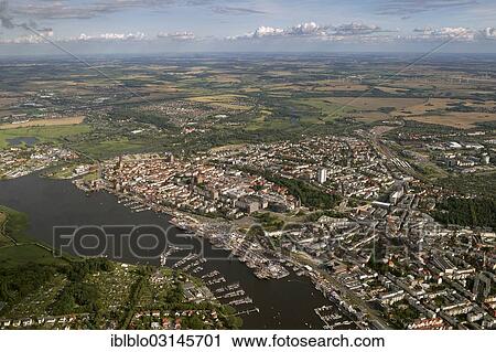 "Aerial view, Rostock Stadthafen, historic harbour, old town, Steintor-Vorstadt quarter and Kroepeliner-Tor-Vorstadt quarter with the southeastern outskirts, Mitte, Berlin, Berlin, Germany, Europe" View Large Photo Image Stock Image - "Aerial view, Rostock Stadthafen, historic harbour, old town, Steintor-Vorstadt quarter and Kroepeliner-Tor-Vorstadt quarter with the southeastern outskirts, Mitte, Berlin, Berlin, Germany, Europe". Fotosearch