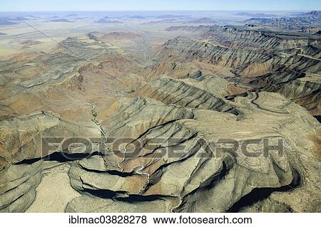 Stock Photo - "Aerial view, rugged landscape between Khomas Hochland and the Namib Desert, Namibia, Africa". Fotosearch