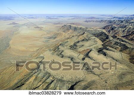 "Aerial view, rugged landscape between Khomas Hochland and the Namib Desert, Namibia, Africa" View Large Photo Image Stock Photo - "Aerial view, rugged landscape between Khomas Hochland and the Namib Desert, Namibia, Africa". Fotosearch