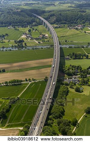 "Aerial view, Ruhrtalbrucke bridge, A52 motorway, Ruhr river, Ruhrtal, Ruhr Valley, between Mulheim and Essen, Ruhr Area, North Rhine-Westphalia, Germany, Europe" View Large Photo Image Stock Image - "Aerial view, Ruhrtalbrucke bridge, A52 motorway, Ruhr river, Ruhrtal, Ruhr Valley, between Mulheim and Essen, Ruhr Area, North Rhine-Westphalia, Germany, Europe". Fotosearch