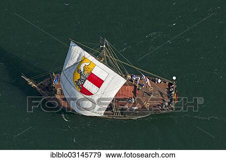 Stock Photo - "Aerial view, sailboat during the Hanse Sail Rostock, Warnemunde, Rostock, Mecklenburg-Western Pomerania, Germany, Europe". Fotosearch