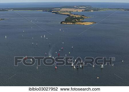 "Aerial view, sailing regatta in the Bay of Greifswald or Greifswald Bodden, sailboats, Middelhagen off the island of Ruegen, Alt Reddevitz, Middelhagen, Rugen, Mecklenburg-Western Pomerania, Germany, Europe" View Large Photo Image Stock Image - "Aerial view, sailing regatta in the Bay of Greifswald or Greifswald Bodden, sailboats, Middelhagen off the island of Ruegen, Alt Reddevitz, Middelhagen, Rugen, Mecklenburg-Western Pomerania, Germany, Europe". Fotosearch