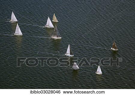 "Aerial view, sailing regatta in the Bay of Greifswald or Greifswald Bodden, sailboats, Middelhagen off the island of Ruegen, Alt Reddevitz, Middelhagen, Rugen, Mecklenburg-Western Pomerania, Germany, Europe" View Large Photo Image Stock Photograph - "Aerial view, sailing regatta in the Bay of Greifswald or Greifswald Bodden, sailboats, Middelhagen off the island of Ruegen, Alt Reddevitz, Middelhagen, Rugen, Mecklenburg-Western Pomerania, Germany, Europe". Fotosearch