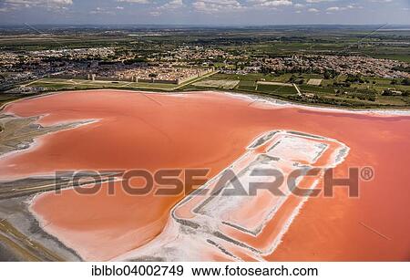 "Aerial view, salt pans, red salt marshes for salt production, Aigues-Mortes, Camargue, Languedoc-Roussillon, South of France, France, Europe" View Large Photo Image Stock Photo - "Aerial view, salt pans, red salt marshes for salt production, Aigues-Mortes, Camargue, Languedoc-Roussillon, South of France, France, Europe". Fotosearch