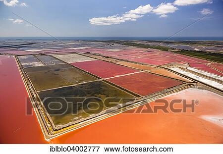 "Aerial view, salt pans, red salt marshes for salt production, Aigues-Mortes, Camargue, Languedoc-Roussillon, South of France, France, Europe" View Large Photo Image Stock Photo - "Aerial view, salt pans, red salt marshes for salt production, Aigues-Mortes, Camargue, Languedoc-Roussillon, South of France, France, Europe". Fotosearch