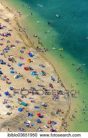 "Aerial view, sandy beach at Silbersee II lake with people swimming and sunbathing, Sythen, Haltern am See, North Rhine-Westphalia, Germany, Europe" View Large Photo Image Stock Image - "Aerial view, sandy beach at Silbersee II lake with people swimming and sunbathing, Sythen, Haltern am See, North Rhine-Westphalia, Germany, Europe". Fotosearch