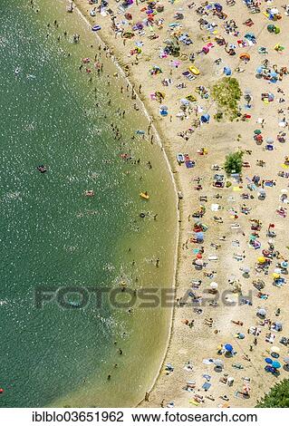 "Aerial view, sandy beach at Silbersee II lake with people swimming and sunbathing, Sythen, Haltern am See, North Rhine-Westphalia, Germany, Europe" View Large Photo Image Stock Image - "Aerial view, sandy beach at Silbersee II lake with people swimming and sunbathing, Sythen, Haltern am See, North Rhine-Westphalia, Germany, Europe". Fotosearch