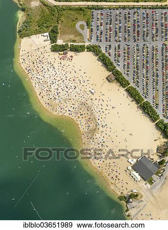 "Aerial view, sandy beach at Silbersee II lake with people swimming and sunbathing, Sythen, Haltern am See, North Rhine-Westphalia, Germany, Europe" View Large Photo Image Stock Photo - "Aerial view, sandy beach at Silbersee II lake with people swimming and sunbathing, Sythen, Haltern am See, North Rhine-Westphalia, Germany, Europe". Fotosearch