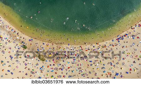 "Aerial view, sandy beach at Silbersee II lake with people swimming and sunbathing, Sythen, Haltern am See, North Rhine-Westphalia, Germany, Europe" View Large Photo Image Stock Photograph - "Aerial view, sandy beach at Silbersee II lake with people swimming and sunbathing, Sythen, Haltern am See, North Rhine-Westphalia, Germany, Europe". Fotosearch