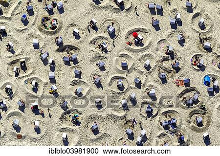 "Aerial view, sandy beach beach with beach chairs and sand ramparts, Wangerooge, East Frisian Islands, East Frisia, Lower Saxony, Germany, Europe" View Large Photo Image Stock Image - "Aerial view, sandy beach beach with beach chairs and sand ramparts, Wangerooge, East Frisian Islands, East Frisia, Lower Saxony, Germany, Europe". Fotosearch