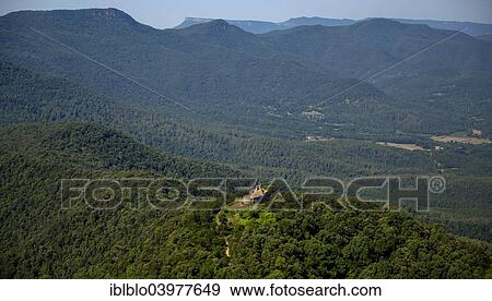 Stock Photo - "Aerial view, Sant Patllari Capella, 1327, near Pujarnol, Porqueres, Catalonia, Spain, Europe". Fotosearch
