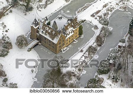 Stock Photograph - "Aerial view, Schloss Hoellinghofen Castle, Neheim, Arnsberg, North Rhine-Westphalia, Germany, Europe". Fotosearch