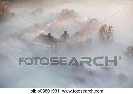 Stock Image - "Aerial view, Schloss Oberwerries moated castle, morning mist, Hamm, Ruhr area, North Rhine-Westphalia, Germany, Europe". Fotosearch