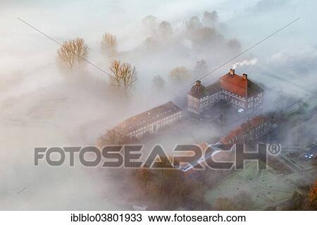 Stock Image - "Aerial view, Schloss Oberwerries moated castle, morning mist, Hamm, Ruhr area, North Rhine-Westphalia, Germany, Europe". Fotosearch