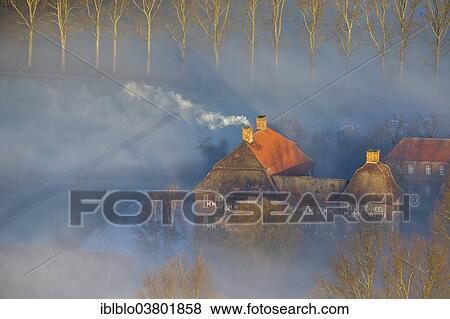 "Aerial view, Schloss Oberwerries moated castle, morning fog over the Lippe river, Hamm, Ruhr area, North Rhine-Westphalia, Germany, Europe" View Large Photo Image Stock Photo - "Aerial view, Schloss Oberwerries moated castle, morning fog over the Lippe river, Hamm, Ruhr area, North Rhine-Westphalia, Germany, Europe". Fotosearch