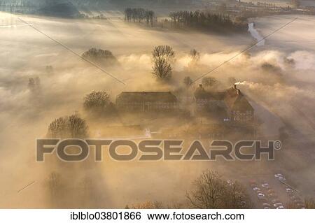 "Aerial view, Schloss Oberwerries moated castle, morning fog over the Lippe river, Hamm, Ruhr area, North Rhine-Westphalia, Germany, Europe" View Large Photo Image Stock Photograph - "Aerial view, Schloss Oberwerries moated castle, morning fog over the Lippe river, Hamm, Ruhr area, North Rhine-Westphalia, Germany, Europe". Fotosearch