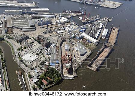 "Aerial view, ship in the Elbe 17 dry dock at the Blohm + Voss shipyard, Hamburg-Port, Hamburg, Hamburg, Germany, Europe" View Large Photo Image Stock Image - "Aerial view, ship in the Elbe 17 dry dock at the Blohm + Voss shipyard, Hamburg-Port, Hamburg, Hamburg, Germany, Europe". Fotosearch