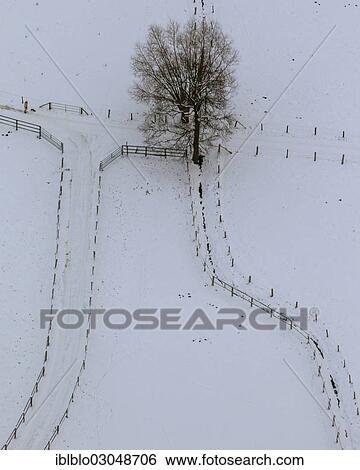 Stock Photograph - "Aerial view, snow-covered dirt roads, Herringen, Hamm, North Rhine-Westphalia, Germany, Europe". Fotosearch