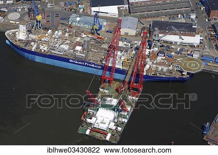 "Aerial view, special ship """"Enquest Producer"""" at the Blohm + Voss Shipyards, Hamburg-Port, Hamburg, Hamburg, Germany, Europe" View Large Photo Image Stock Image - "Aerial view, special ship """"Enquest Producer"""" at the Blohm + Voss Shipyards, Hamburg-Port, Hamburg, Hamburg, Germany, Europe". Fotosearch