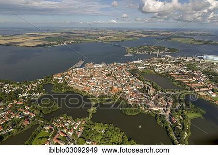 "Aerial view, Stralsund, with the old town island surrounded by water at the sound of Strelasund, Baltic Sea, Stralsund, Mecklenburg-Western Pomerania, Germany, Europe" View Large Photo Image Stock Photo - "Aerial view, Stralsund, with the old town island surrounded by water at the sound of Strelasund, Baltic Sea, Stralsund, Mecklenburg-Western Pomerania, Germany, Europe". Fotosearch
