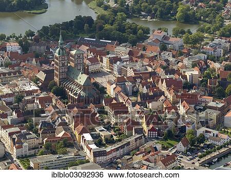 "Aerial view, Stralsund, with the old town island surrounded by water at the sound of Strelasund, St. Nikolai church, Stralsund, Mecklenburg-Western Pomerania, Germany, Europe" View Large Photo Image Stock Photograph - "Aerial view, Stralsund, with the old town island surrounded by water at the sound of Strelasund, St. Nikolai church, Stralsund, Mecklenburg-Western Pomerania, Germany, Europe". Fotosearch