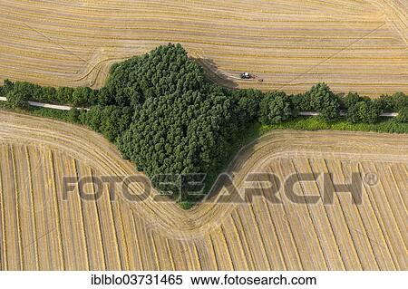 "Aerial view, straw turner on a field, Hamm, North Rhine-Westphalia, Germany, Europe" View Large Photo Image Stock Photography - "Aerial view, straw turner on a field, Hamm, North Rhine-Westphalia, Germany, Europe". Fotosearch