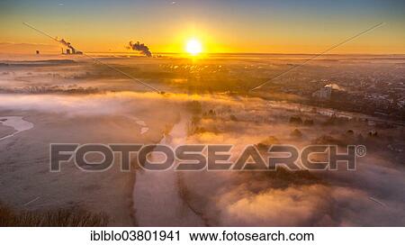 "Aerial view, sunrise, morning mist above the Lippe river, gas turbine power plant Trianel power plant, Hamm, Ruhr area, North Rhine-Westphalia, Germany, Europe" View Large Photo Image Stock Image - "Aerial view, sunrise, morning mist above the Lippe river, gas turbine power plant Trianel power plant, Hamm, Ruhr area, North Rhine-Westphalia, Germany, Europe". Fotosearch
