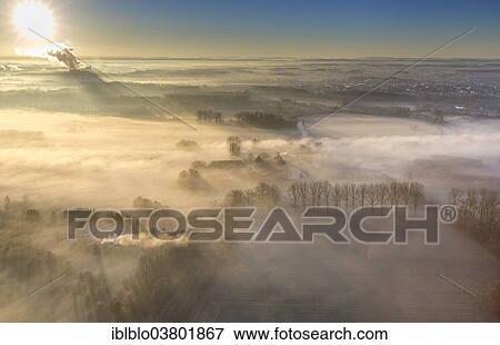 "Aerial view, sunrise, Schloss Oberwerries moated castle, morning fog over the Lippe river, Hamm, Ruhr area, North Rhine-Westphalia, Germany, Europe" View Large Photo Image Stock Photo - "Aerial view, sunrise, Schloss Oberwerries moated castle, morning fog over the Lippe river, Hamm, Ruhr area, North Rhine-Westphalia, Germany, Europe". Fotosearch