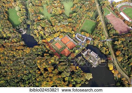 "Aerial view, tennis clubhouse, Tennisclub Haus Wittringen TCHW e. V., Schloss Wittringen Palace with its gardens and urban forest, Gladbeck, Ruhr area, North Rhine-Westphalia, Germany, Europe" View Large Photo Image Stock Image - "Aerial view, tennis clubhouse, Tennisclub Haus Wittringen TCHW e. V., Schloss Wittringen Palace with its gardens and urban forest, Gladbeck, Ruhr area, North Rhine-Westphalia, Germany, Europe". Fotosearch