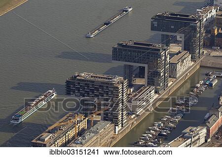 "Aerial view, the Kranhaus buildings on river Rhine, Rheinauhafen, Cologne, Rhineland, North Rhine-Westphalia, Germany, Europe" View Large Photo Image Stock Image - "Aerial view, the Kranhaus buildings on river Rhine, Rheinauhafen, Cologne, Rhineland, North Rhine-Westphalia, Germany, Europe". Fotosearch