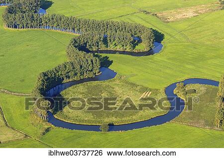 "Aerial view, the Schwinge river, natural river landscape with trees, Stade, Lower Saxony, Germany, Europe" View Large Photo Image Stock Photograph - "Aerial view, the Schwinge river, natural river landscape with trees, Stade, Lower Saxony, Germany, Europe". Fotosearch