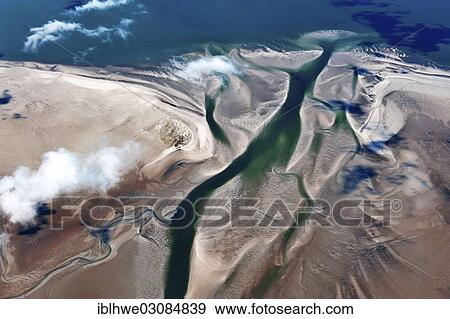 "Aerial view, tidal channel at Hallig Hooge, small island in the Wadden Sea, Husum, Schleswig-Holstein, Germany, Europe" View Large Photo Image Stock Photo - "Aerial view, tidal channel at Hallig Hooge, small island in the Wadden Sea, Husum, Schleswig-Holstein, Germany, Europe". Fotosearch