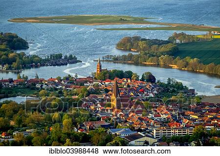 "Aerial view, town of Robel, Church of St. Nikolai at the front and St. Mary's Church at the back, harbour entrance to Muritz Lake, Robel Muritz, Mecklenburg Lake District, Mecklenburg-Western Pomerania, Germany, Europe" View Large Photo Image Stock Photo - "Aerial view, town of Robel, Church of St. Nikolai at the front and St. Mary's Church at the back, harbour entrance to Muritz Lake, Robel Muritz, Mecklenburg Lake District, Mecklenburg-Western Pomerania, Germany, Europe". Fotosearch