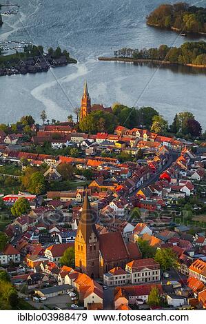 "Aerial view, town of Robel, Church of St. Nikolai at the front and St. Mary's Church at the back, harbour entrance to Muritz Lake, Robel Muritz, Mecklenburg Lake District, Mecklenburg-Western Pomerania, Germany, Europe" View Large Photo Image Stock Photo - "Aerial view, town of Robel, Church of St. Nikolai at the front and St. Mary's Church at the back, harbour entrance to Muritz Lake, Robel Muritz, Mecklenburg Lake District, Mecklenburg-Western Pomerania, Germany, Europe". Fotosearch