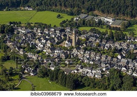 "Aerial view, town view with the Catholic parish church of St. Alexander, Schmallenberg, Sauerland, North Rhine-Westphalia, Germany, Europe" View Large Photo Image Stock Photo - "Aerial view, town view with the Catholic parish church of St. Alexander, Schmallenberg, Sauerland, North Rhine-Westphalia, Germany, Europe". Fotosearch