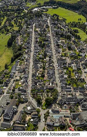 "Aerial view, town view with the Catholic parish church of St. Alexander between Weststrasse and Oststrasse, Schmallenberg, Sauerland, North Rhine-Westphalia, Germany, Europe" View Large Photo Image Stock Photo - "Aerial view, town view with the Catholic parish church of St. Alexander between Weststrasse and Oststrasse, Schmallenberg, Sauerland, North Rhine-Westphalia, Germany, Europe". Fotosearch