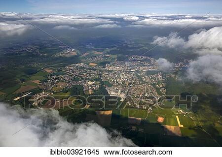 "Aerial view, townscape through the clouds, Menden, Sauerland, North Rhine-Westphalia, Germany, Europe" View Large Photo Image Stock Photography - "Aerial view, townscape through the clouds, Menden, Sauerland, North Rhine-Westphalia, Germany, Europe". Fotosearch