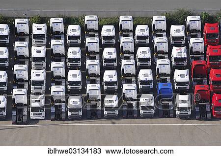 "Aerial view, tractor units of trucks parked close together, stockpile, of the company """"Equipment Services"""", Hamburg, Hamburg, Hamburg, Germany, Europe" View Large Photo Image Stock Image - "Aerial view, tractor units of trucks parked close together, stockpile, of the company """"Equipment Services"""", Hamburg, Hamburg, Hamburg, Germany, Europe". Fotosearch