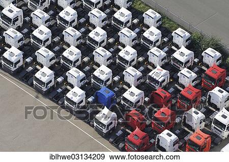 Stock Photo - "Aerial view, tractor units of trucks parked close together, stockpile, of the company """"Equipment Services"""", Hamburg, Hamburg, Hamburg, Germany, Europe". Fotosearch
