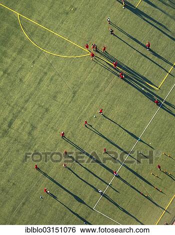 "Aerial view, training on the football pitch of the Hammer Spielvereinigung SpVg sports association, players cast long shadows, Hamm, North Rhine-Westphalia, Germany, Europe" View Large Photo Image Stock Photograph - "Aerial view, training on the football pitch of the Hammer Spielvereinigung SpVg sports association, players cast long shadows, Hamm, North Rhine-Westphalia, Germany, Europe". Fotosearch