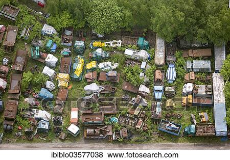 "Aerial view, truck scrapyard, Schubert Walter Karosseriebau GmbH, Oberhausen, North Rhine-Westphalia, Germany, Europe" View Large Photo Image Stock Photo - "Aerial view, truck scrapyard, Schubert Walter Karosseriebau GmbH, Oberhausen, North Rhine-Westphalia, Germany, Europe". Fotosearch