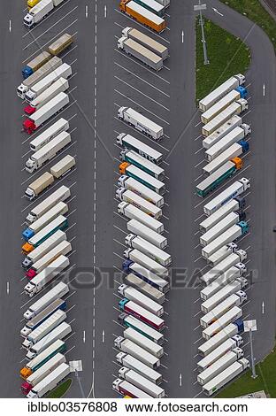Stock Photo - "Aerial view, trucks parked in a truck park, Kaufland logistics centre, Dortmund-Derne, Dortmund, North Rhine-Westphalia, Germany, Europe". Fotosearch